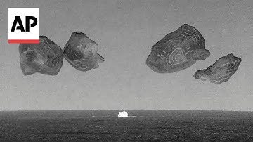 Tech billionaire and crew return to Earth after first private spacewalk