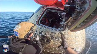 Artemis 2 capsule's hatch opened by Navy dive team after splashdown