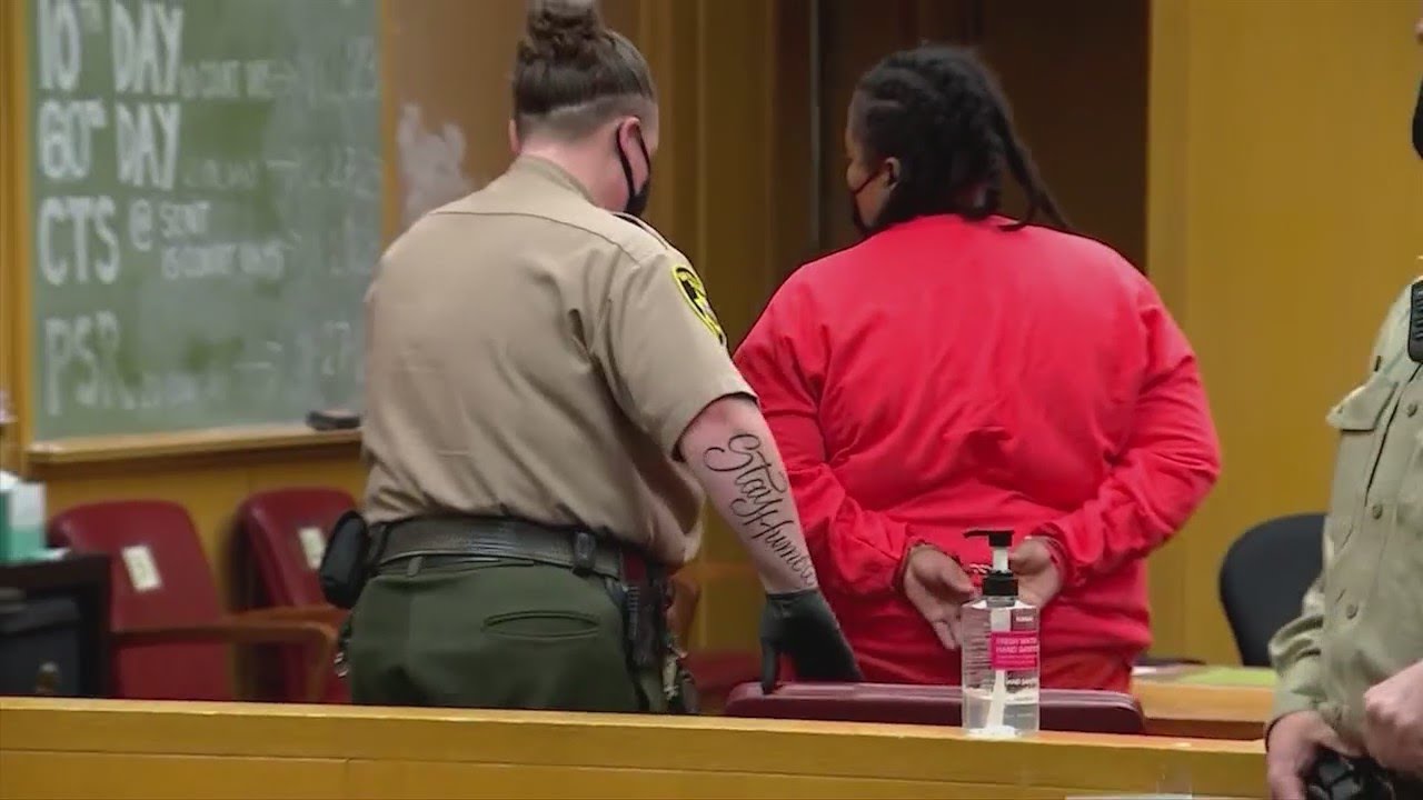 Woman charged with murdering 2 children makes first court appearance ...