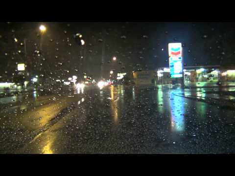 Entering Rainy Yuma Arizona at Yuma Palms Mall on 16th Street Drive through wet town streets