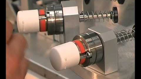 Rotary pad printing machine for shampoo closures