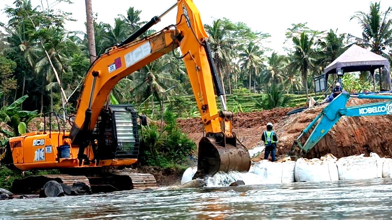 EXCAVATOR JCB - digging stones in the river - YouTube