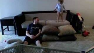 Jenna jumping from the couch