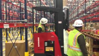 Stand up forklift in small aisle