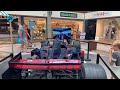 Racen in Formule 1 simulator in Winkelcentrum ?t Loo in Heiloo