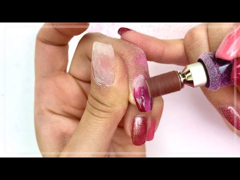 Video: Modi semplici per rimuovere le punte delle unghie: 11 passaggi (con immagini)