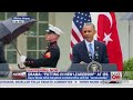 Obama asks Marines for umbrellas