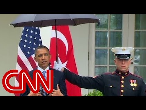 Obama Asks Marines For Umbrellas