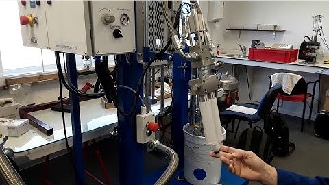 Metering and mixing system for flexible filling of cartridges with adhesives