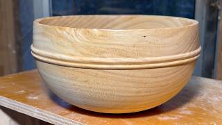 Richard Raffan turns very green hardwood — a sleeper offcut.