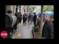Brad Pitt Greets Fans And Signs Autographs Outside New York City Hotel
