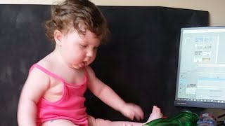 Cute Baby At Dad's Working Table - It's Funny