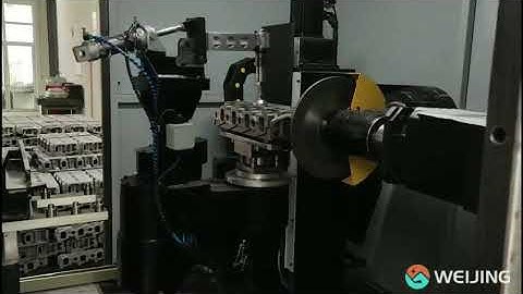 Weijing auto grinding machine is grinding engine block part
