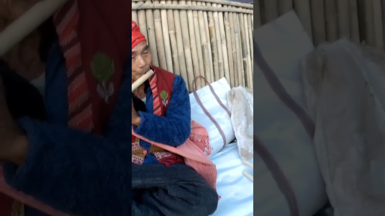 Old Man Playing Flute