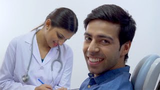 HD video of a smiling handsome man in the hospital / dental clinic