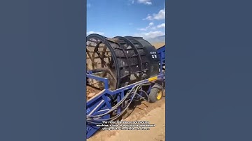 Field Clearance: Rock Picking Machine at Work