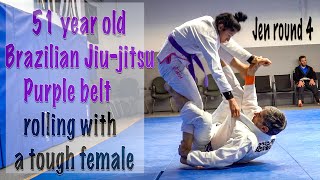 51 year old Jiu-jitsu purple belt rolling with a tough female