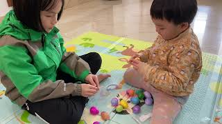 kids open egg hatchimals