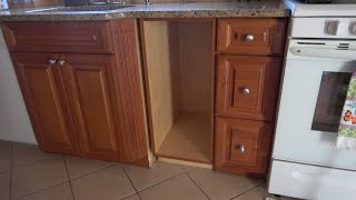 Remove trash compactor. DIY Install new cabinet + dual trash can.