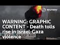 WARNING: GRAPHIC CONTENT - Death tolls rise in Israel-Gaza violence