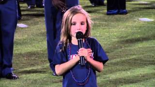 Preslee Campbell sings the National Anthem in the Pit