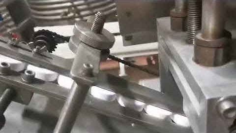 BID ON EQUIPMENT: Item 411047 - 6 Spindle SUREKAP SK6000-18 Capper with Vibratory Bowl Feeder