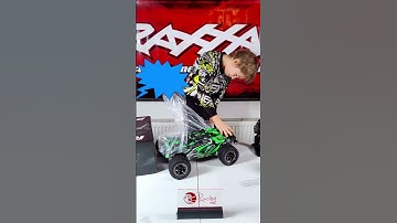 Unboxing the Traxxas Rustler 4WD Ultimate was a blast! Kiddo turns mishaps into laughter 😂🤩