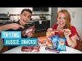 Trying The Best AUSTRALIAN SNACKS! - Tim Tams, Cherry Ripe, Cheezels, Fantales & MORE