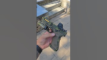 Ported gen 5 Glock 17 customized by Firing Squad Firearms with trijicon RMRhd stippling tlr1 magwell