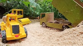 truk rc roler buldoser dump truk miniatur proses pengrataan jalan