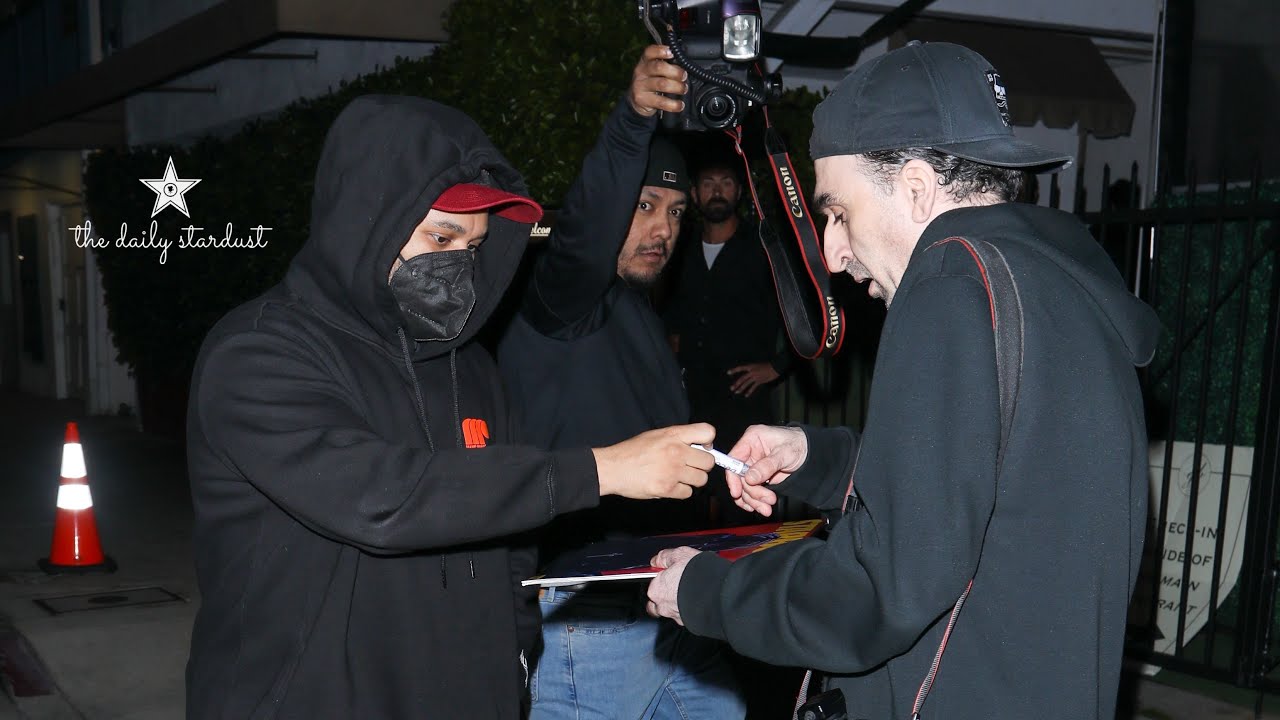 The Weeknd Signs Autograph For Lucky Awaiting Fan.