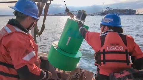 Temporary channel opens as crews continue to clear site of Baltimore bridge collapse