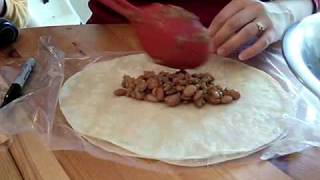 A demonstration on how to fold burrito, perfect meal stash in the
freezer enjoy later.