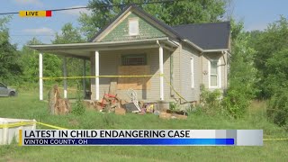 New details after four people charged, 16 children removed from home