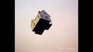 Dorothy's house from The Wizard of Oz Flying and Spinning