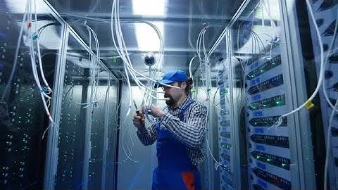 IT Technician Installing Data Cables Stock Video