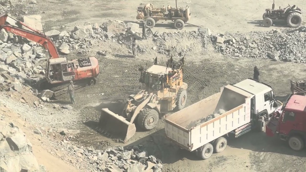 onWhen the Machine Wins! Moving a Huge RockConstruction Machinery Power | Real Site Foota