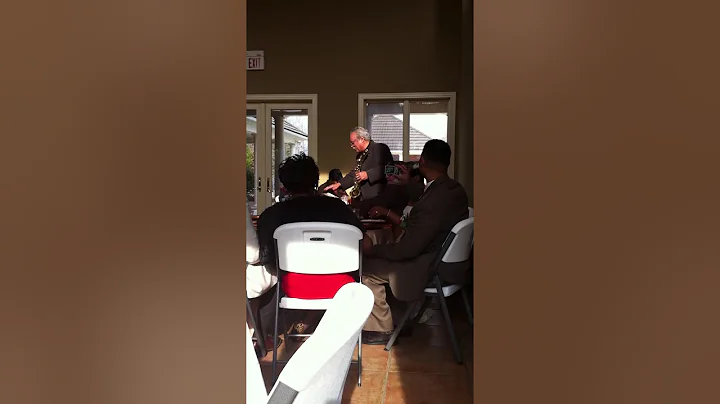 Ronnie Reese playing sax at sons wedding reception