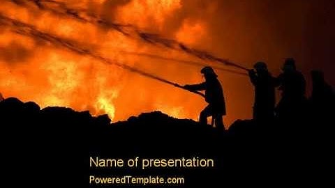Fire Fighting On Massive Fire PowerPoint Template by PoweredTemplate.com
