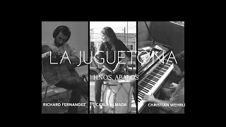 La Juguetona Por Christian Wehrli, Richard Fernández Y Carla Almada.