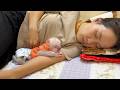 Lil Pavpav Sleep On Hand's Mom, Both Look Exhausted From Playful