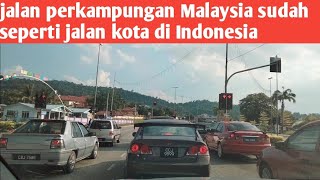 jalan raya perkampungan Malaysia sangatlah luas dan halus