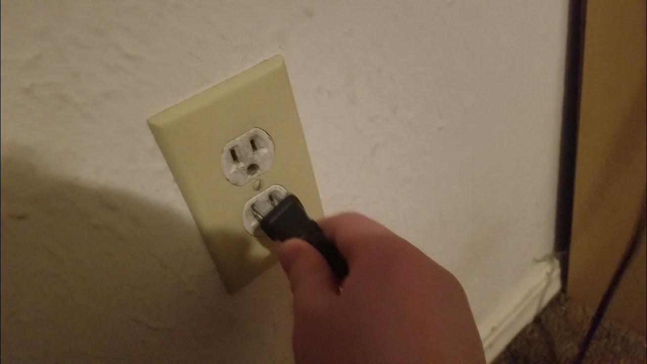 plugging something into an outlet - YouTube