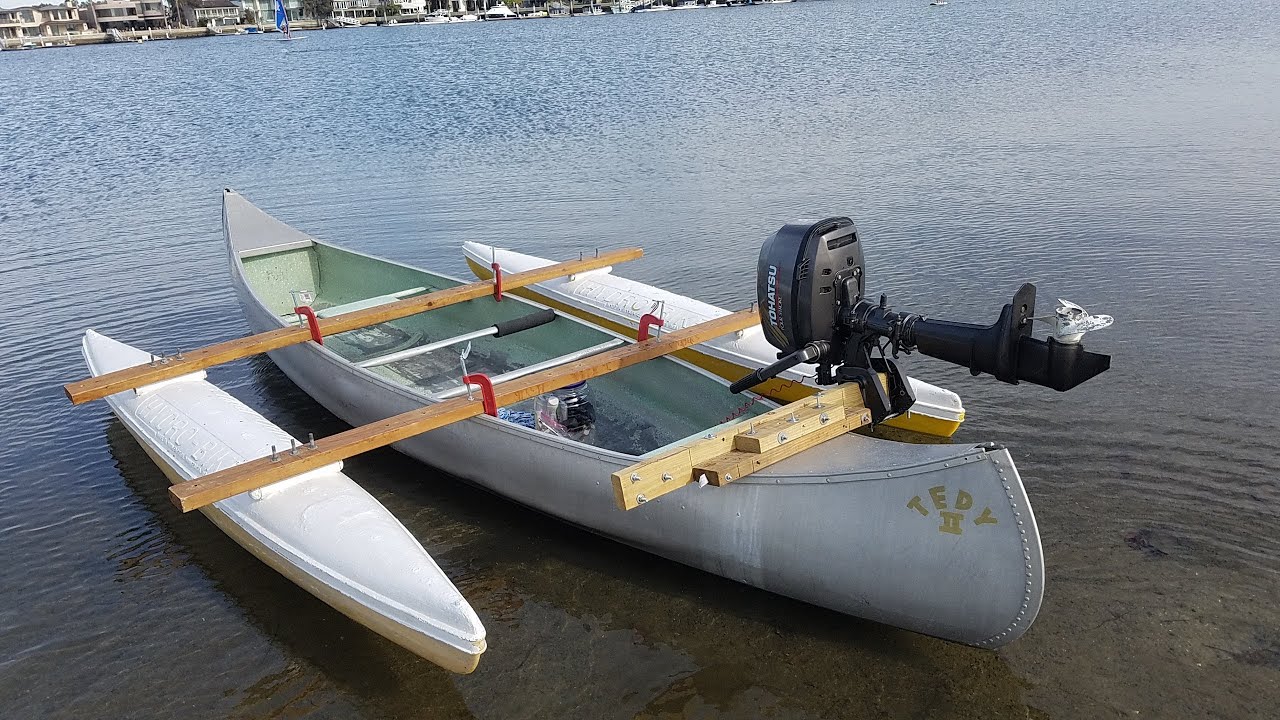Sea-Nymph Canoe with 5HP outboard - YouTube.