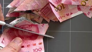 Artist Luke Cornish cuts up and blends real money to create paper for his latest art exhibition 😳🤑