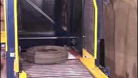 Omni Metalcraft Corp. Tire Handling Continuous Vertical Conveyor