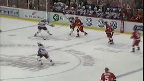 Johan Franzen crushes Sami Lepisto