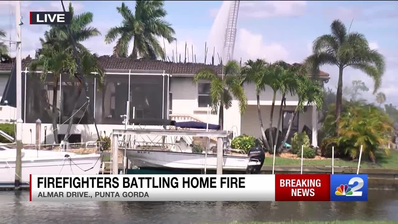 Firefighters battle house fire on Almar Drive in Punta Gorda - YouTube