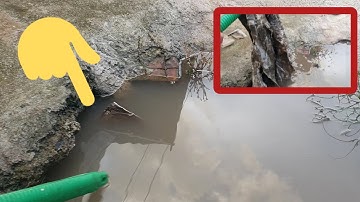 Removal Plastic and Mud Clogged Culvert Drain after heavy Rain