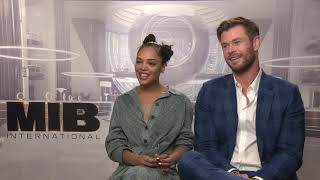 Men In Black: International: Chris Hemsworth \& Tessa Thompson Official Movie Interview | ScreenSlam